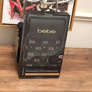 Bebe Black and Pink Monogram Crossbody Pouch